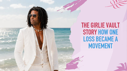 Girlie Vault founder Mell Thomas standing on a beach in a white linen suit, the ocean behind him.